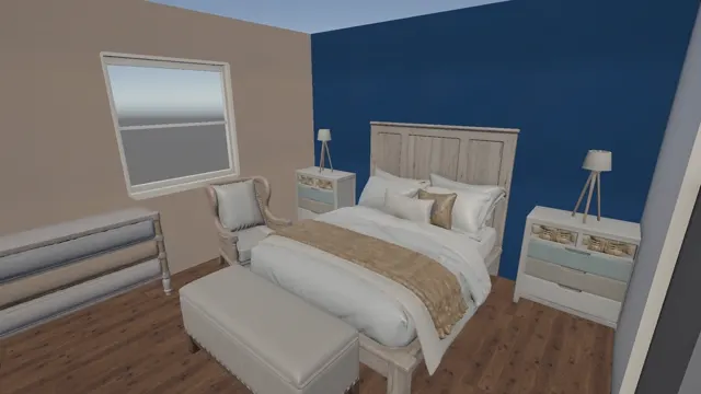 Bedroom with a navy accent wall and dark wood floor